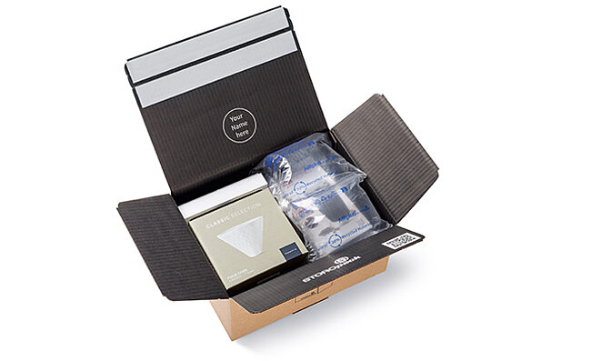 Protective air cushioning in a shipping box for secure packaging.